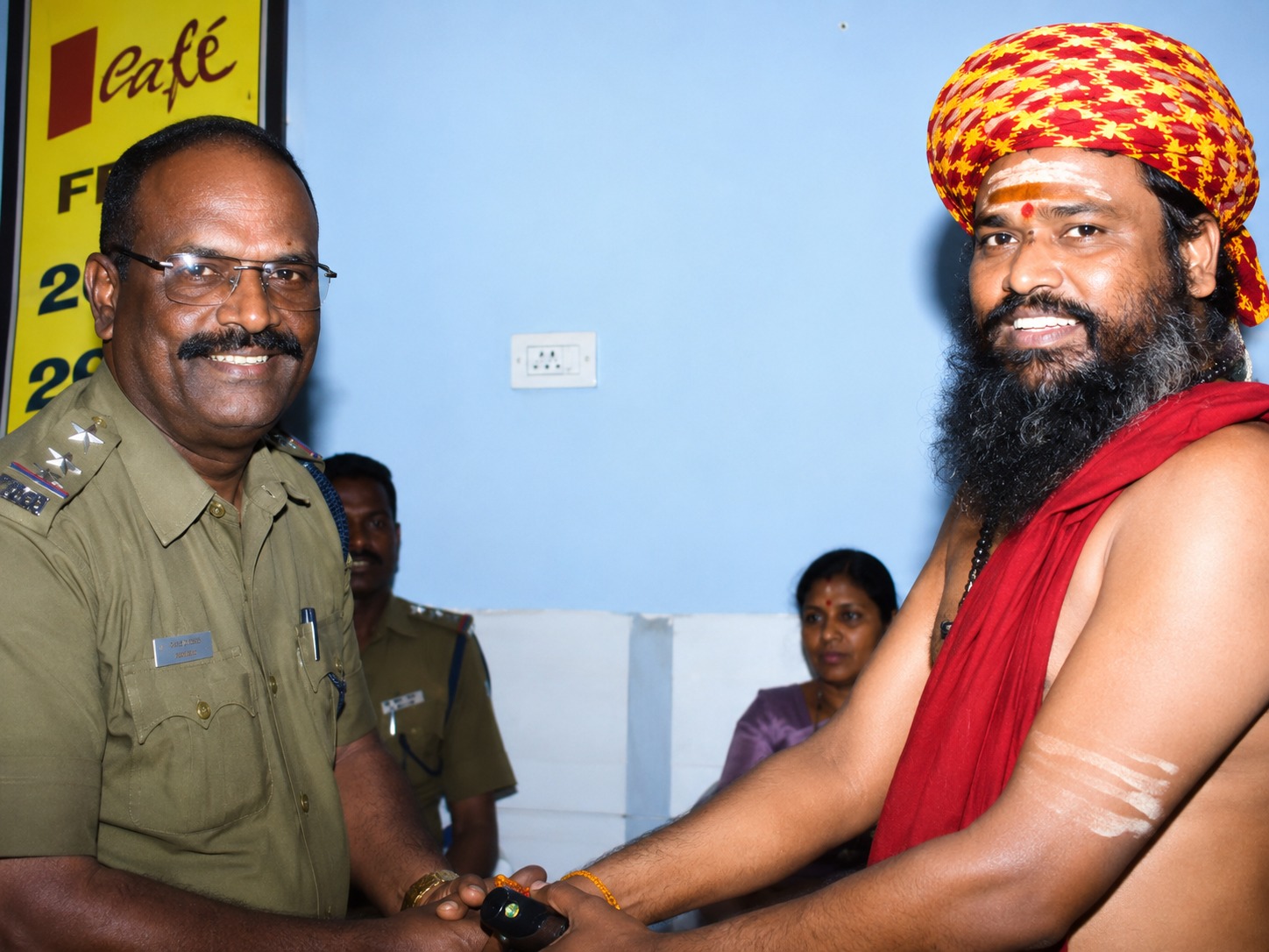 Guruji felicitated by police officials